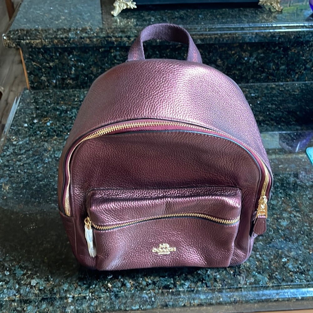 Brand new Coach Backpack Metallic Wine Color